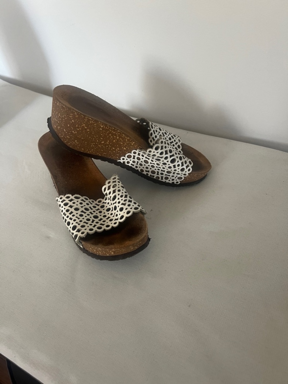 White Laser-Cut Wedge Slide Sandals